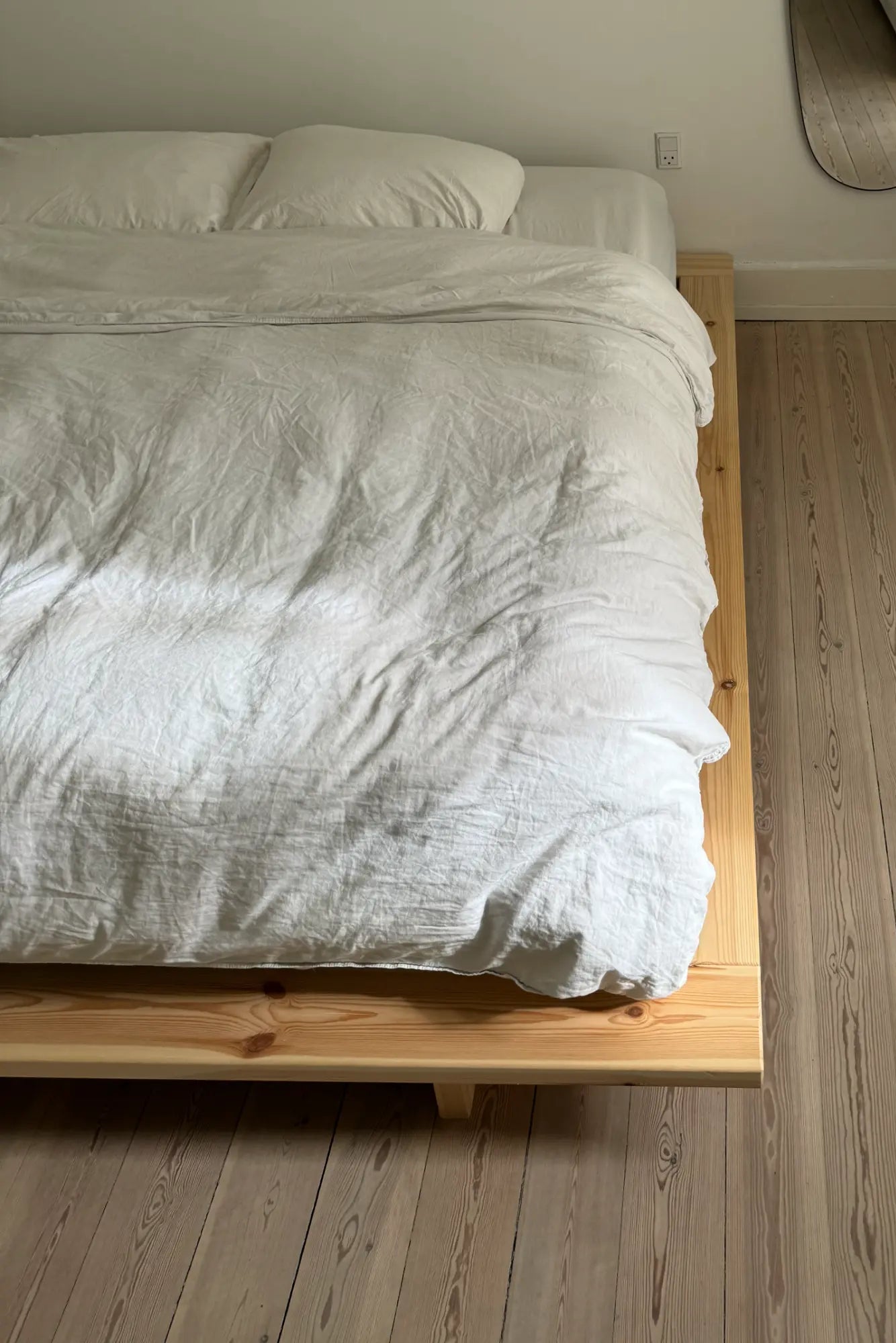 Handcrafted Japan Bed made from raw, untreated wood, with clean, minimalist design