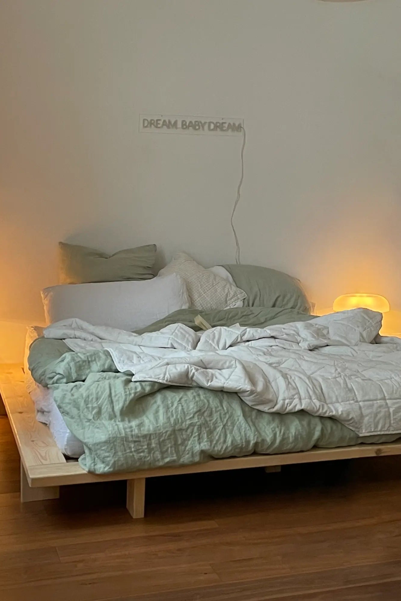 Handcrafted wooden Japan Bed with a raw, natural finish and sleek, minimalist design