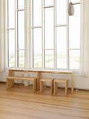 join-in dining table karup design in a room with big windows that bring alot of natural light