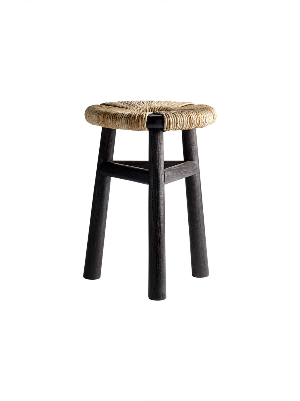 Tine K Kayu Stool, an organic modern accent stool featuring a round hand-woven natural fiber seat in light beige tones, set atop a sturdy frame of dark stained solid wood with four tapered legs. This rustic Scandinavian design offers versatile seating or a stylish side table for living rooms, bedrooms, or entryways.
