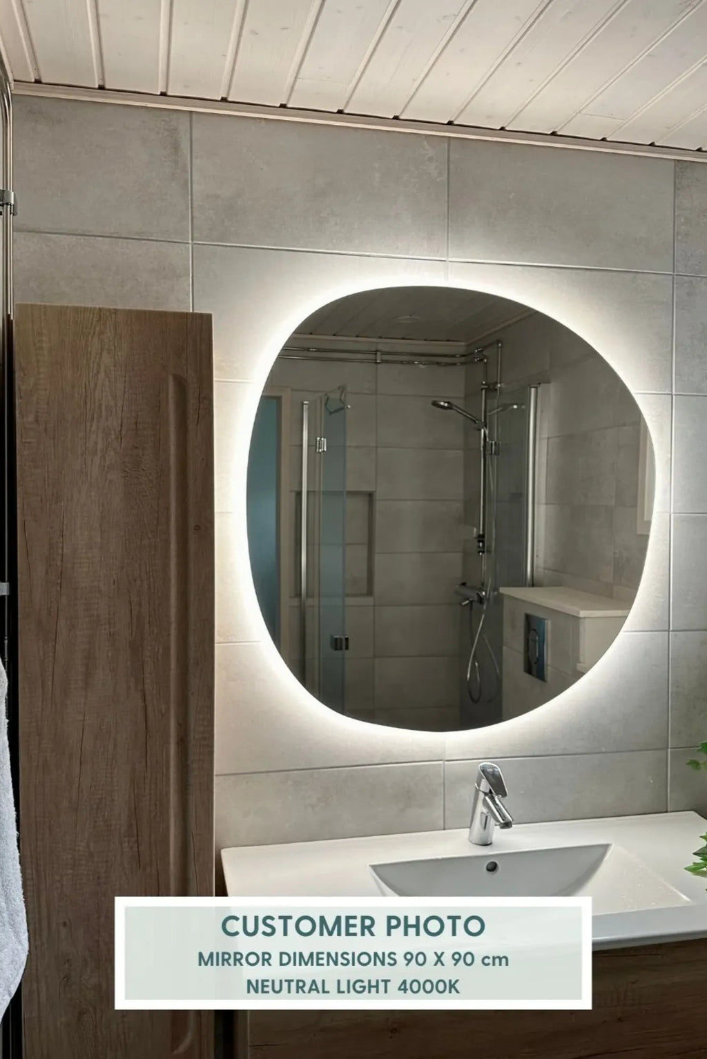 Pebble mirror with lights reflecting elegant and modern interior design