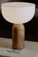 Sleek Kizu Portable Table Lamp with soft, diffuse glow