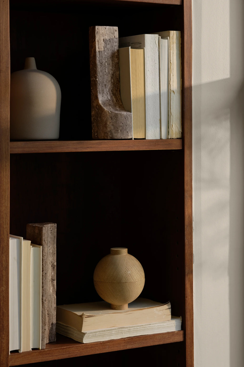 Kristina Dam Wooden Sphere, a modern minimalist decorative storage container crafted from light natural wood with a smooth finish and subtle wood grain, featuring a perfectly spherical shape with a removable flat-top lid and a small base. This elegant Scandinavian-designed wooden sphere is ideal for organic modern shelf styling, bedroom accents, or sophisticated home office decor.