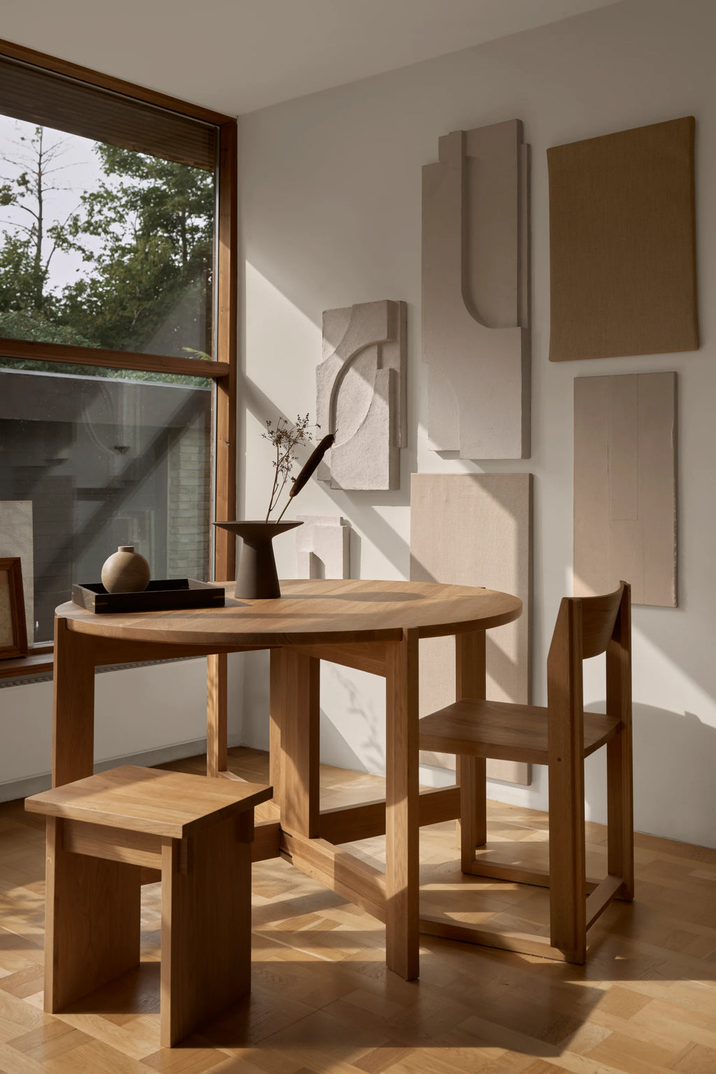 Kristina Dam Artisan Stool, a solid oak wood stool featuring a robust, rectangular silhouette with a natural light brown finish and thick, sturdy legs. This versatile modern minimalist design is perfect as an accent stool, side table, or seating in Scandinavian living rooms, Japandi bedrooms, or contemporary entryways.