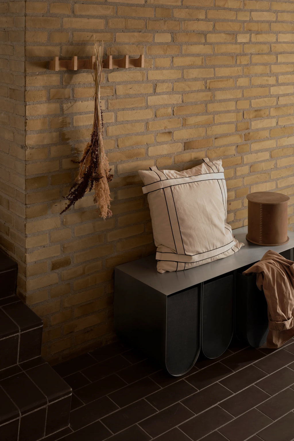 Kristina Dam Long Column Coat Rack, a minimalist solid light oak wall hanger featuring a horizontal bar with five integrated, rounded column-like pegs. Its clean lines and organic modern design embody Scandinavian style, making it ideal as a functional entryway coat rack, stylish hallway wall hooks, or a subtle bedroom accent.