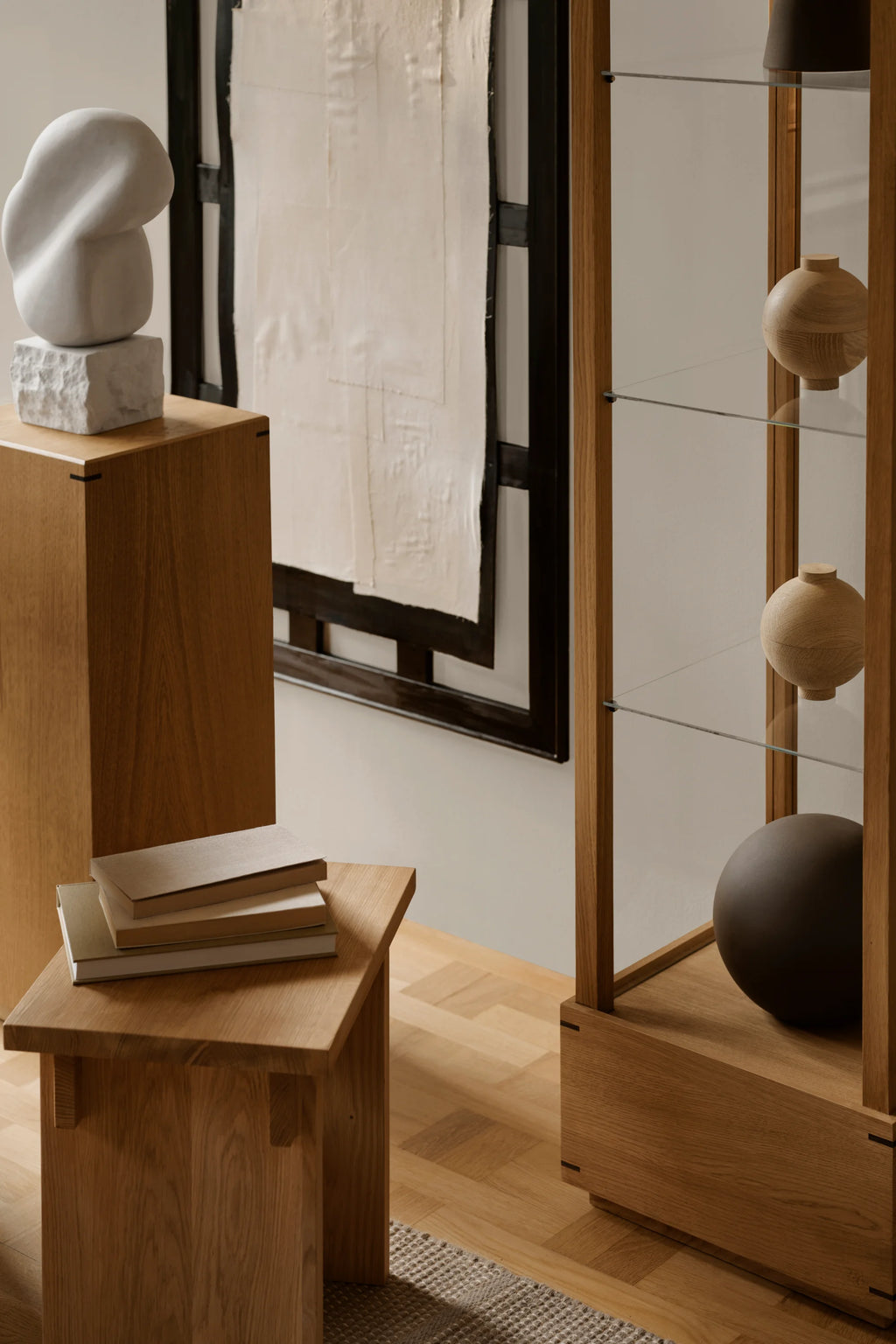 Kristina Dam Artisan Stool, a sturdy solid oak wood stool with a modern minimalist rectangular design, featuring subtle black rectangular inlays for a sophisticated touch.