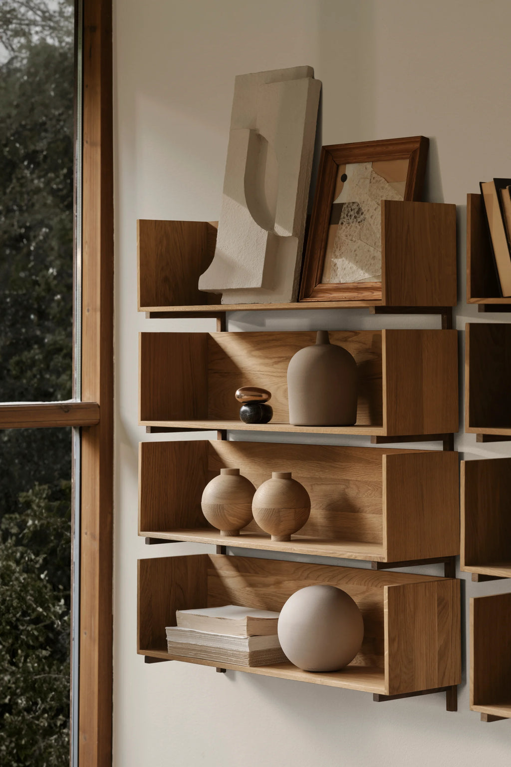 Kristina Dam Wooden Sphere, a modern minimalist decorative storage object crafted from natural light solid wood with a smooth, matte finish and a distinctive spherical shape. This Scandinavian-inspired design features a subtle horizontal seam, suggesting a hidden compartment for small treasures or home office essentials. Perfect for organic modern shelf styling, living room accents, or minimalist bedroom decor.