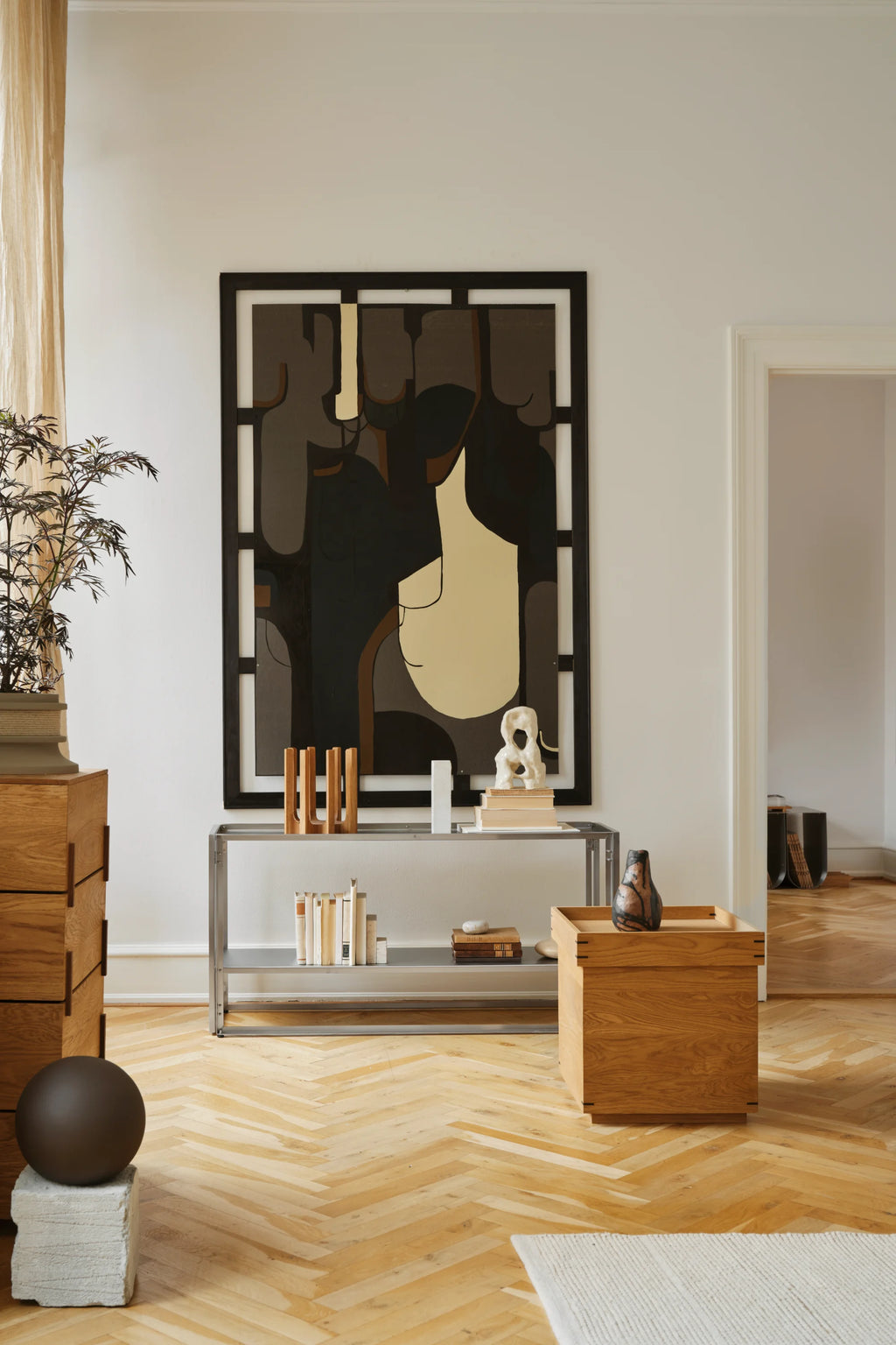 Kristina Dam Japanese Tray Table, a minimalist square coffee table crafted from natural solid oak wood, featuring distinctive visible joinery and a convenient removable tray top.