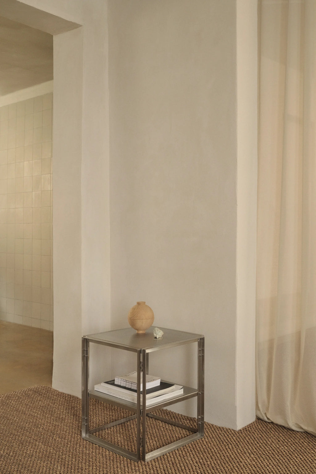 Kristina Dam Foldable Side Table, a sleek modern minimalist two-tiered square side table constructed from durable matte stainless steel, featuring clean lines and an industrial-chic aesthetic. This versatile Danish design metal accent table is ideal for contemporary living rooms, minimalist bedrooms, or as a functional bedside table.