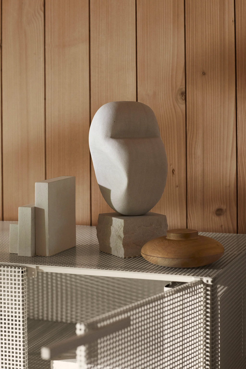 Kristina Dam Wooden Galaxy, a modern minimalist decorative storage box crafted from smooth, natural light oak wood. This round, flat wooden container features a subtle raised cylindrical handle or lid, showcasing warm, organic tones and a clean, Scandinavian design.