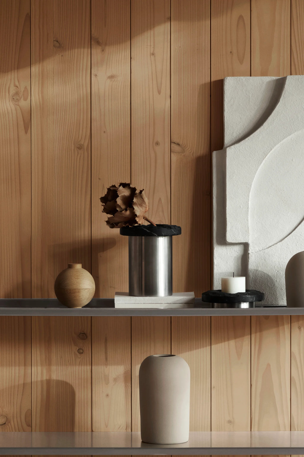 Kristina Dam Wooden Sphere, a modern minimalist solid wood decorative object featuring a smooth spherical design crafted from light natural oak with visible grain, designed as a two-part container with a small opening. Perfect for Scandinavian shelf styling, storing small treasures, or as an organic accent in contemporary living rooms and bedrooms.