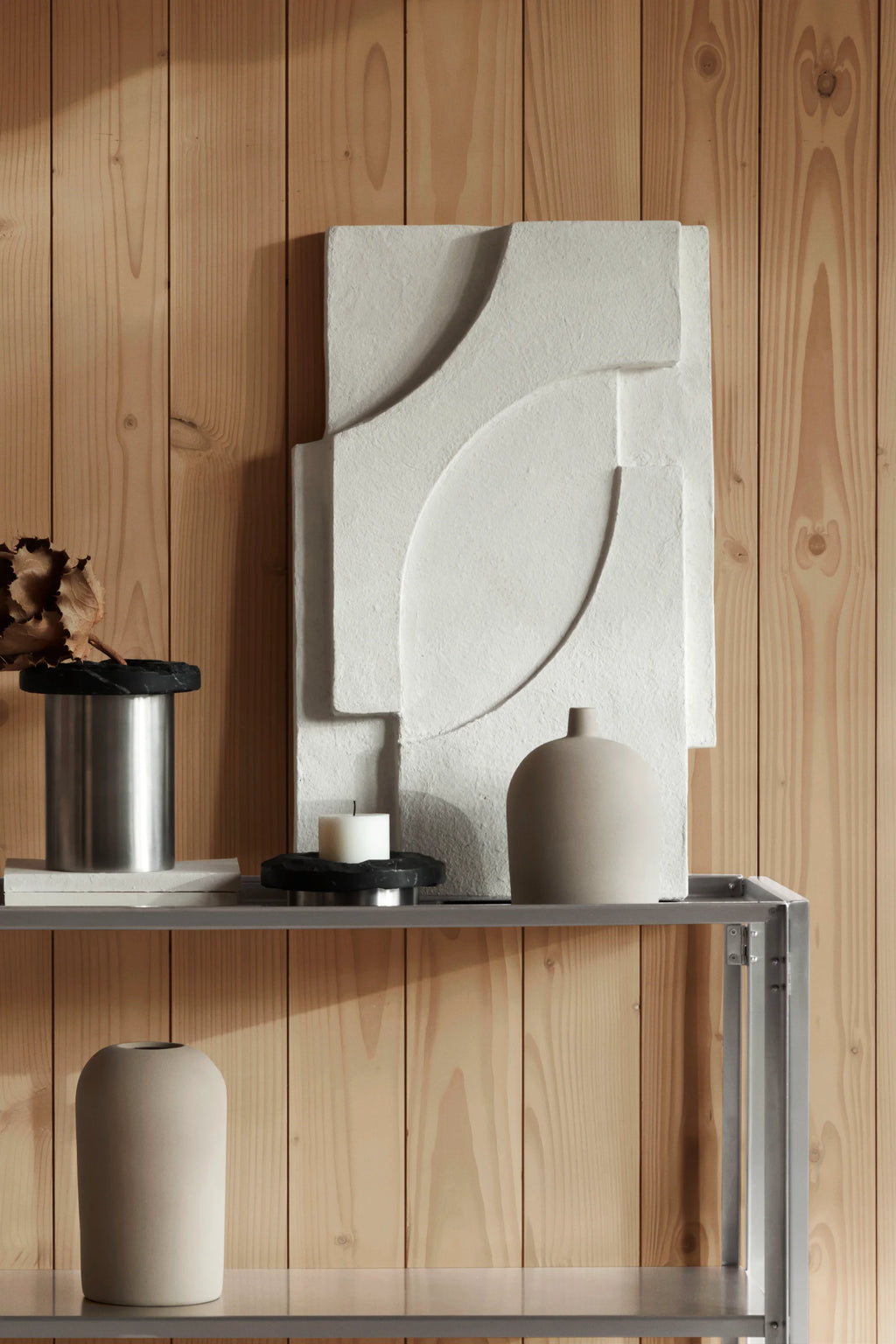Kristina Dam Serif Relief M, a striking off-white sculptural wall art piece crafted from textured plaster, showcasing hand-sculpted abstract organic and geometric relief shapes for a contemporary minimalist aesthetic.