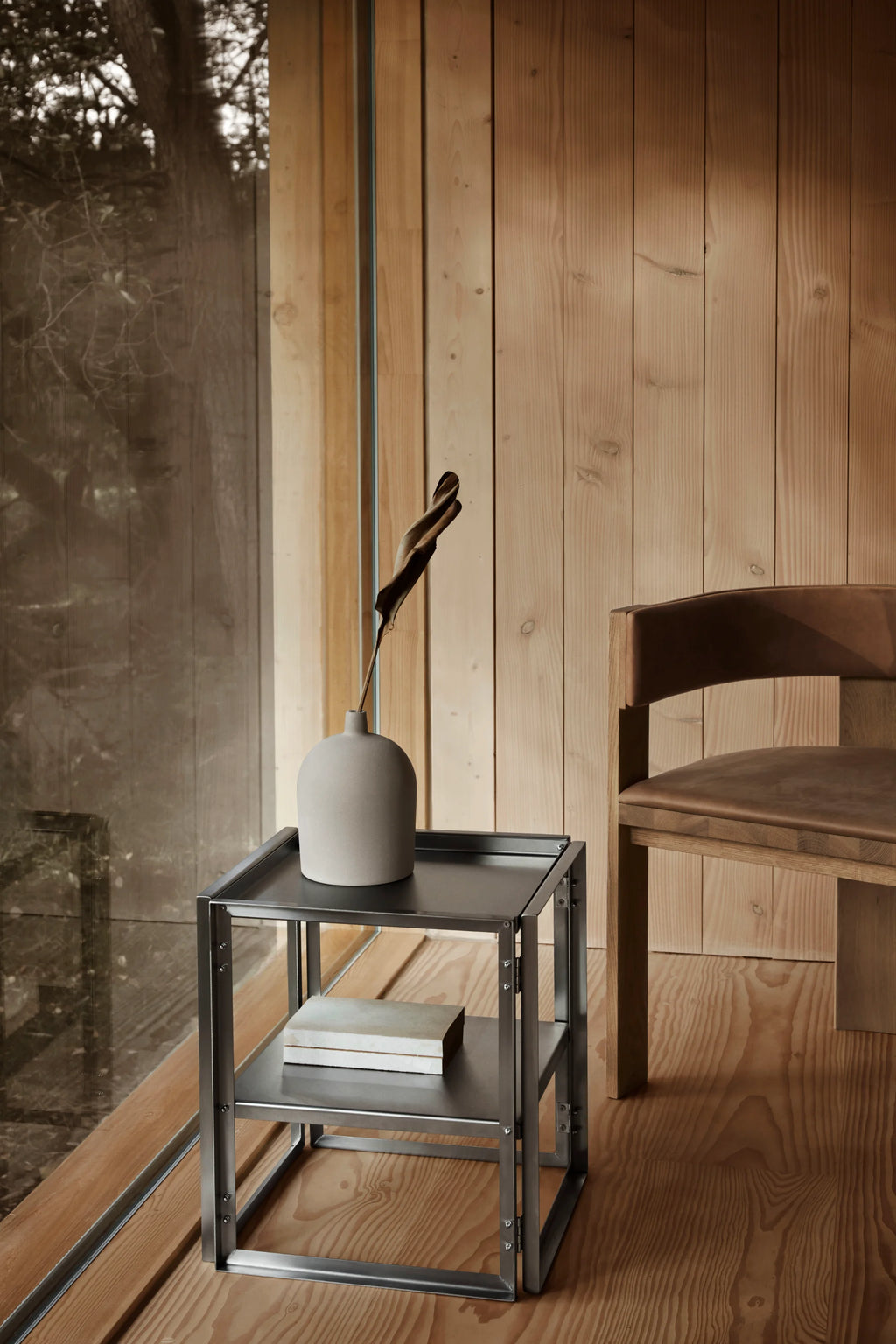 Kristina Dam Foldable Side Table, a modern minimalist two-tiered side table crafted from dark grey matte powder-coated steel with a sleek rectangular silhouette and clean industrial lines. This versatile metal end table is perfect for compact living rooms, bedroom nightstands, or contemporary home office spaces.
