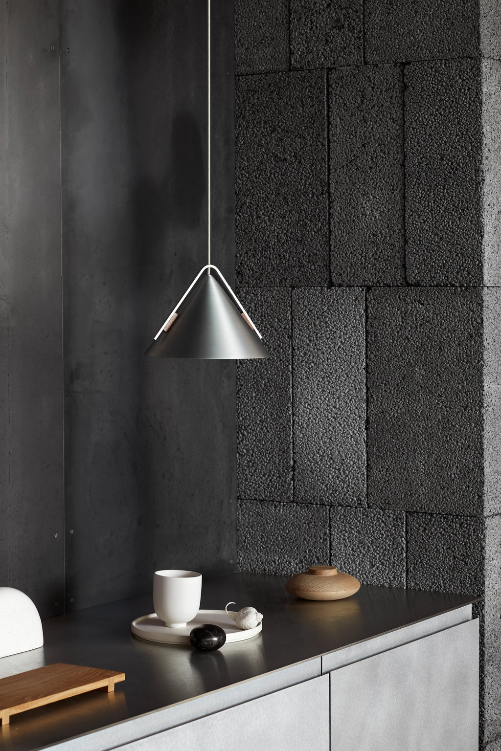 Kristina Dam Wooden Galaxy, a natural solid wood decorative storage container featuring a smooth, organic, pebble-like shape with a subtle lid, crafted from light-toned wood. This modern minimalist wood box is perfect for Scandinavian shelf styling, home office decor, or as an organic accent in contemporary living rooms.