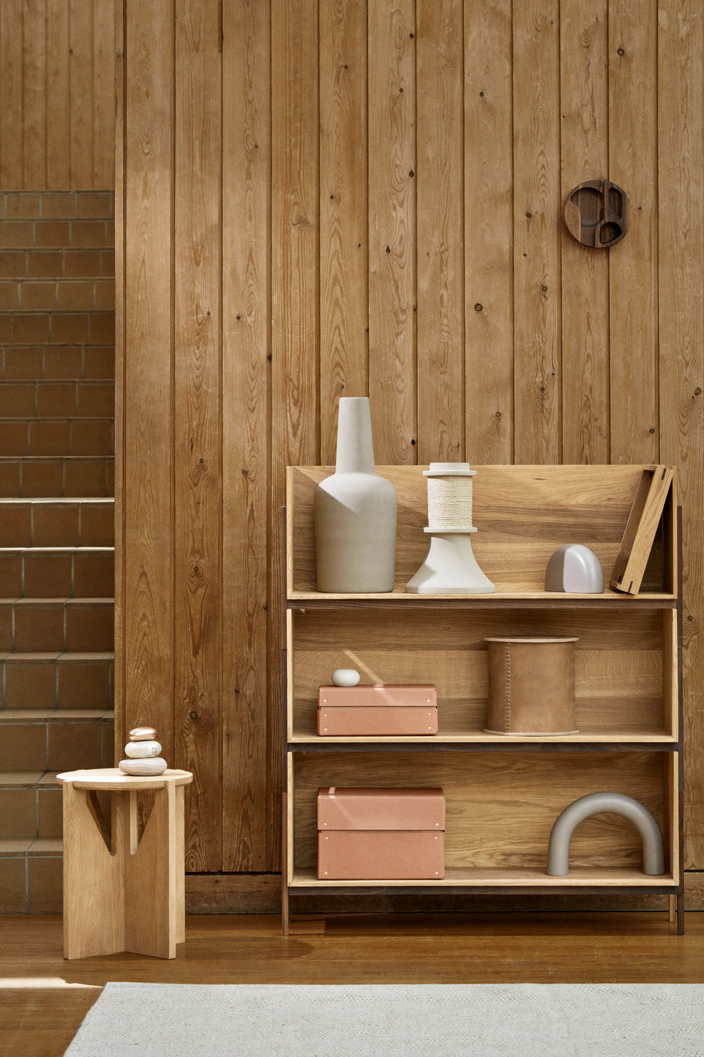 Kristina Dam Stitched Leather Box, a rectangular decorative storage box crafted from smooth terracotta-colored leather with contrasting white stitched detailing and a fitted lid. This minimalist leather organizer offers stylish storage for office supplies, small accessories, or shelf styling in Scandinavian and contemporary interiors.