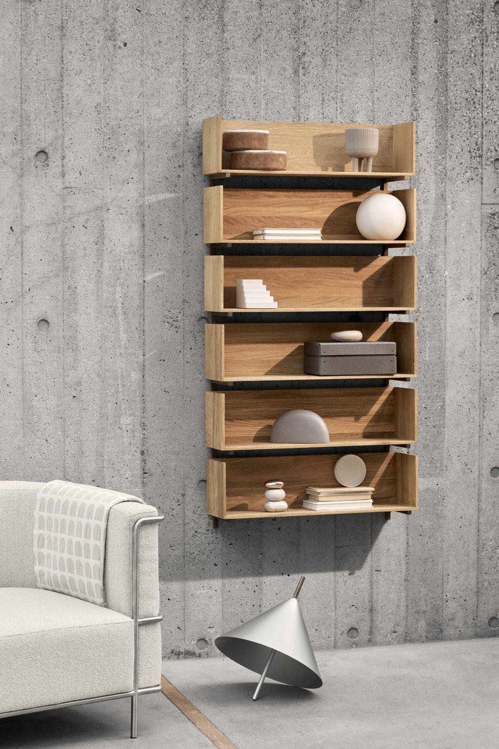 Kristina Dam Stack Wall Shelf, a modern minimalist wall-mounted shelving unit crafted from natural solid oak wood, featuring a unique vertical stack of open rectangular compartments with a staggered profile. This Scandinavian design display shelf is perfect for contemporary living rooms, home offices, or hallways seeking stylish and functional storage.