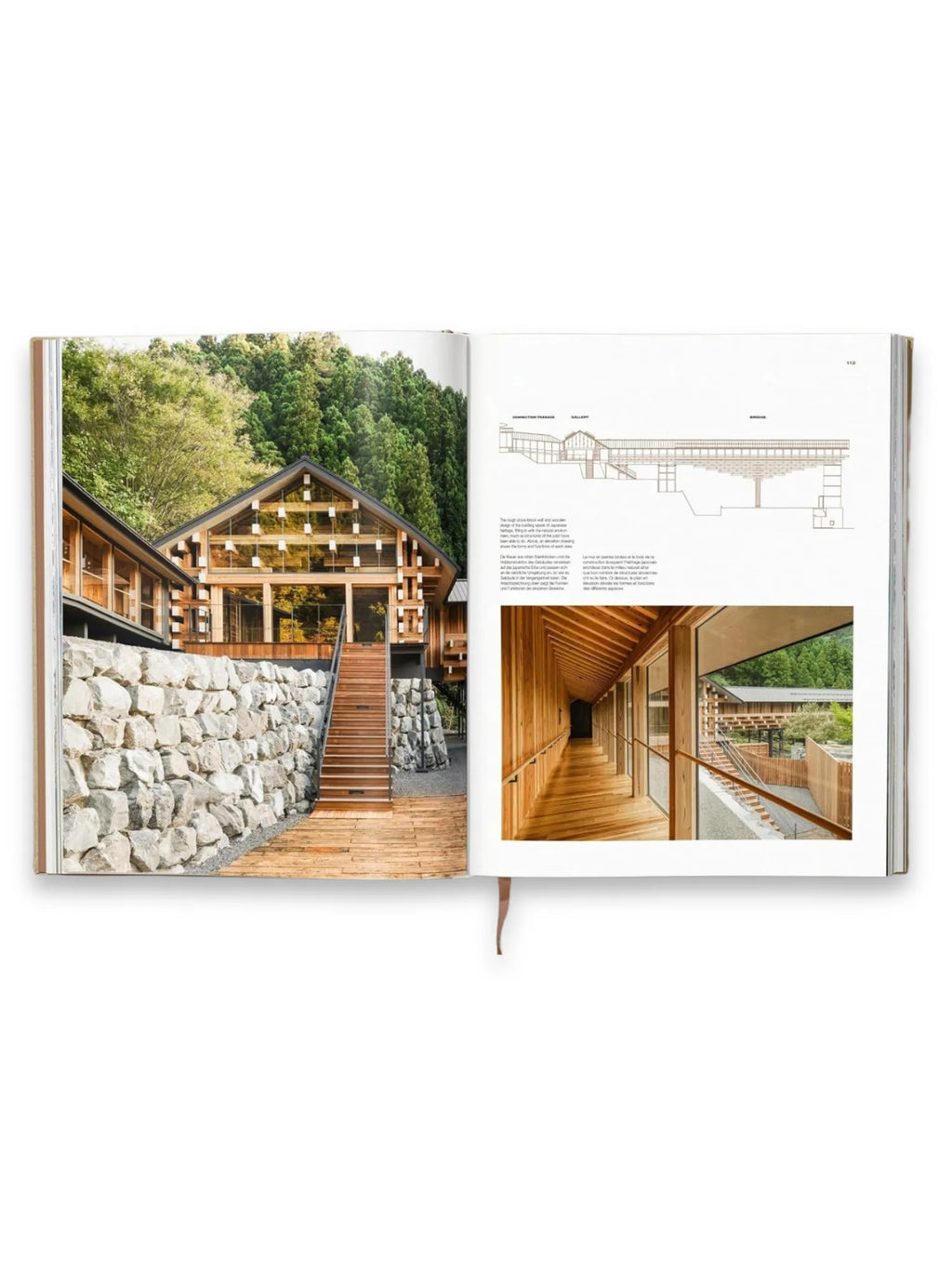 Book Kuma. Complete Works 1988–Today, open to pages featuring a modern Japanese timber and stone building with large glass windows, a detailed architectural drawing, and a wooden interior hallway. This comprehensive architecture book is a must-have for architects, designers, and enthusiasts of contemporary Japanese design.