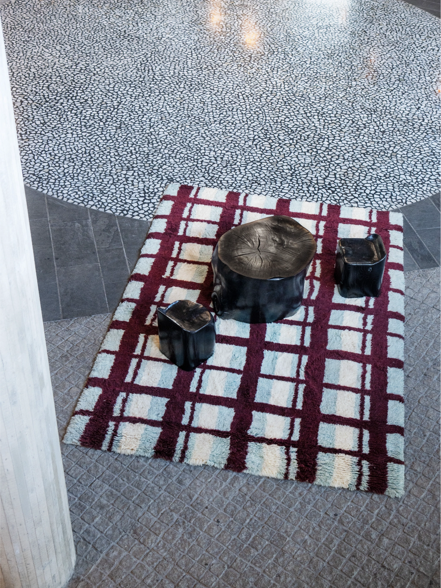Layered Arbor Shaggy Rug, a cozy area rug featuring a modern plaid pattern in deep burgundy and light blue-green hues on an off-white base. Perfect for adding warmth and contemporary style to any l...