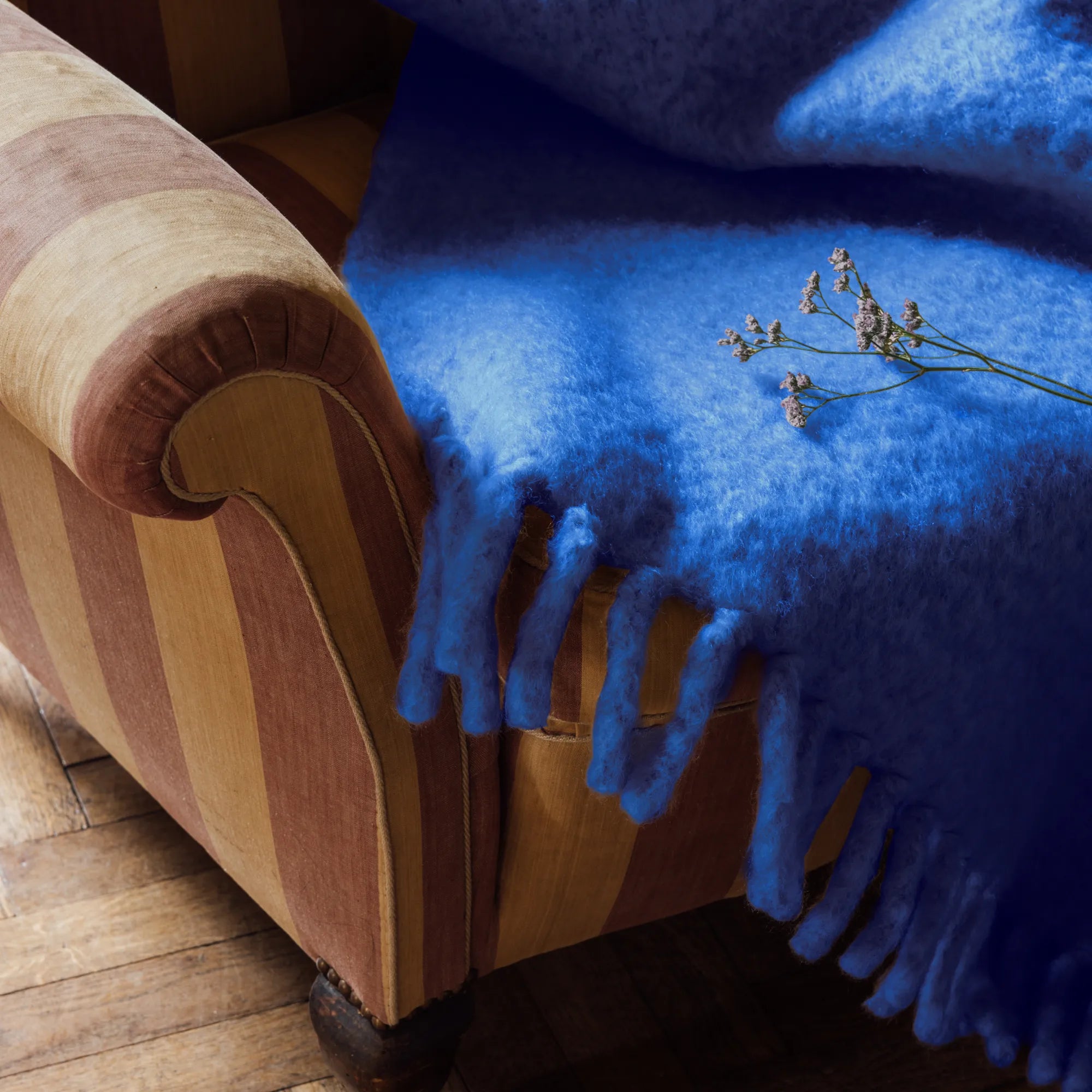 Hand-knitted chunky mohair blanket in warm caramel shade