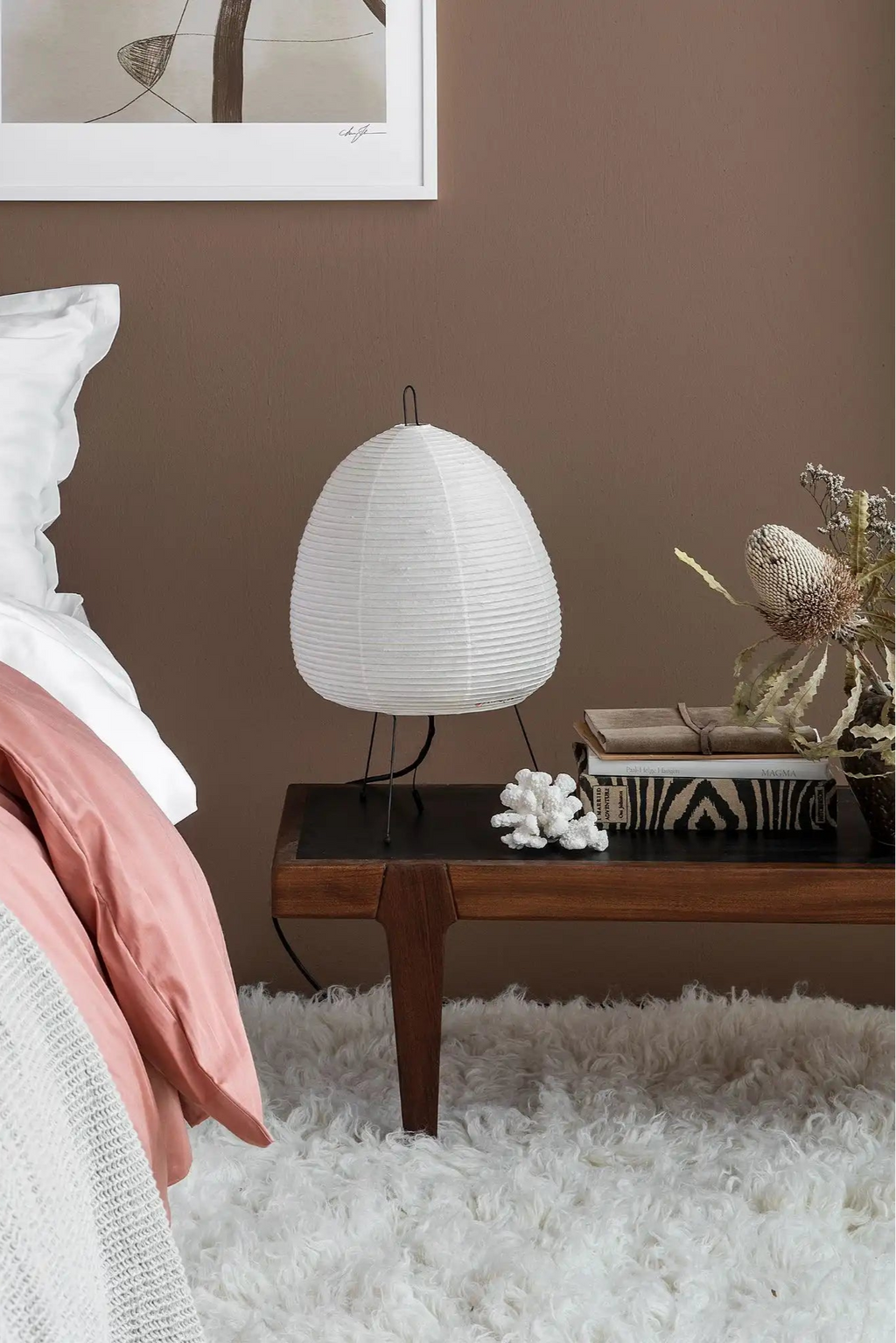 Layered Shaggy Rug, a luxurious off-white, long-pile sheepskin-style area rug with a thick, soft texture. Perfect for adding warmth and comfort to a cozy bedroom or living space.