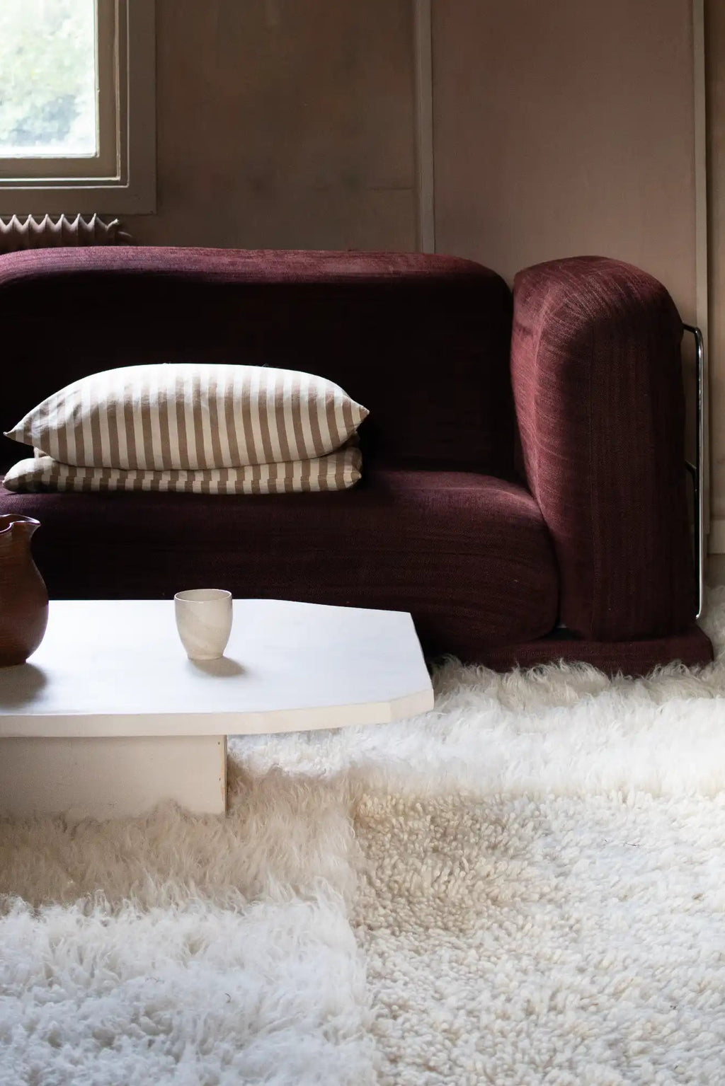 Layered Shaggy Checked Rug, a luxurious white and cream textured shag area rug with a subtle checkerboard pattern, bringing warmth and modern bohemian style to any living space.