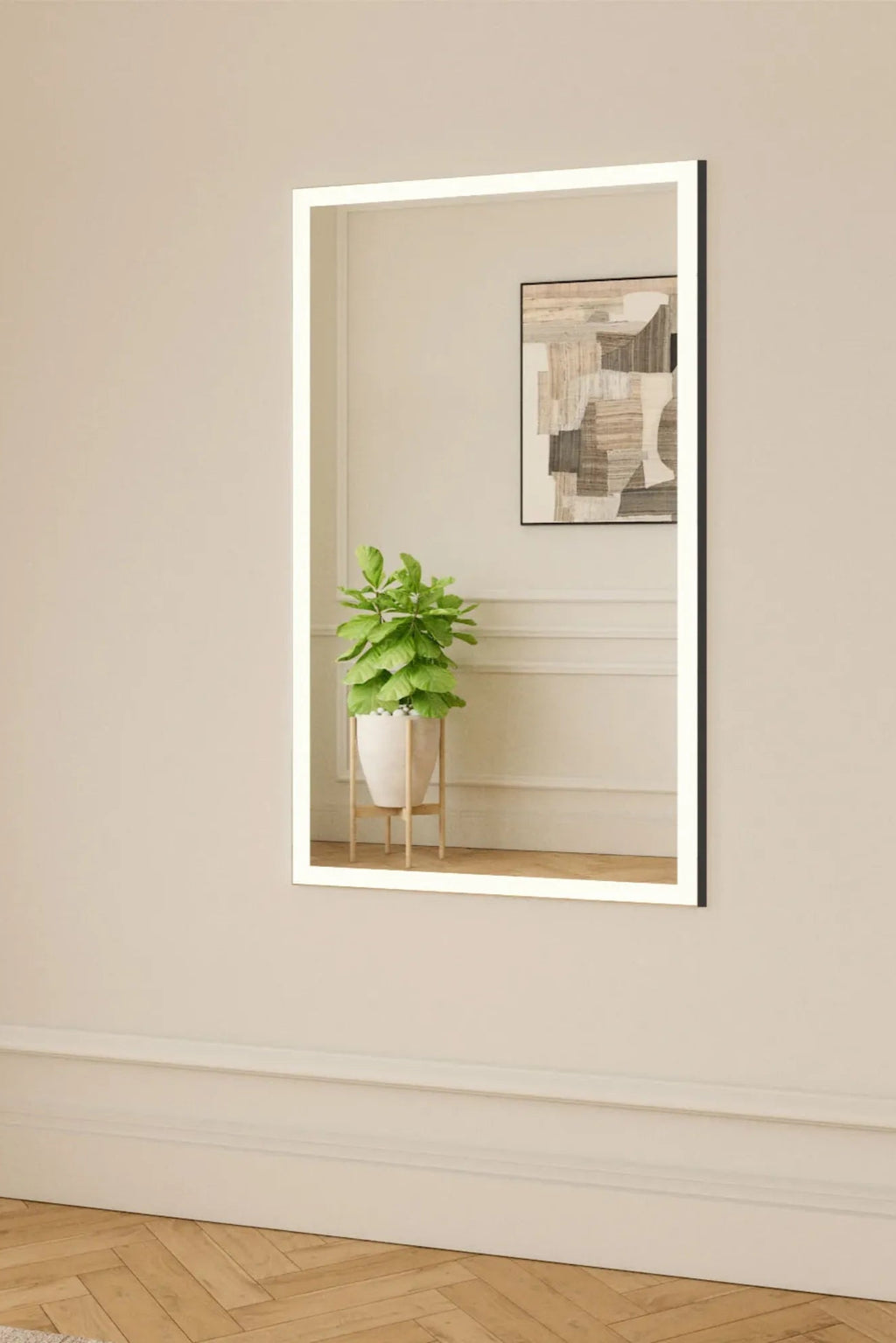 TCL Studios Full Lux Mirror With LED Lights, a sleek modern rectangular mirror featuring integrated LED backlighting that casts a bright, even glow, all encased in a slim matte black metal frame. This contemporary lighted mirror is perfect as a stylish bathroom vanity mirror, an illuminated entryway accent, or a minimalist bedroom dressing mirror.