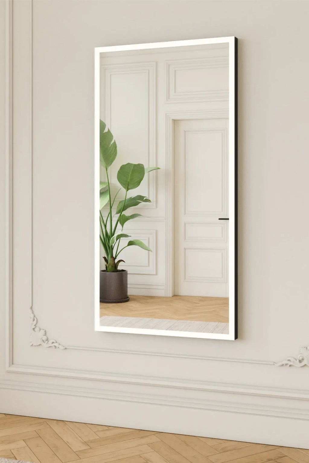 TCL Studios Full Lux Mirror With LED Lights, a sleek modern full-length rectangular mirror featuring integrated bright white LED lights framing the glass, with a slim black frame edge. This contemporary lighted mirror is perfect for a bedroom, dressing room, or minimalist entryway, offering both style and functional illumination.