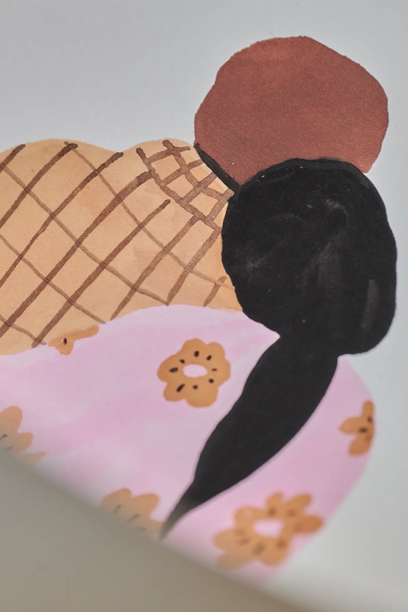 A happy couple sits on a bench in the park, holding hands and smiling