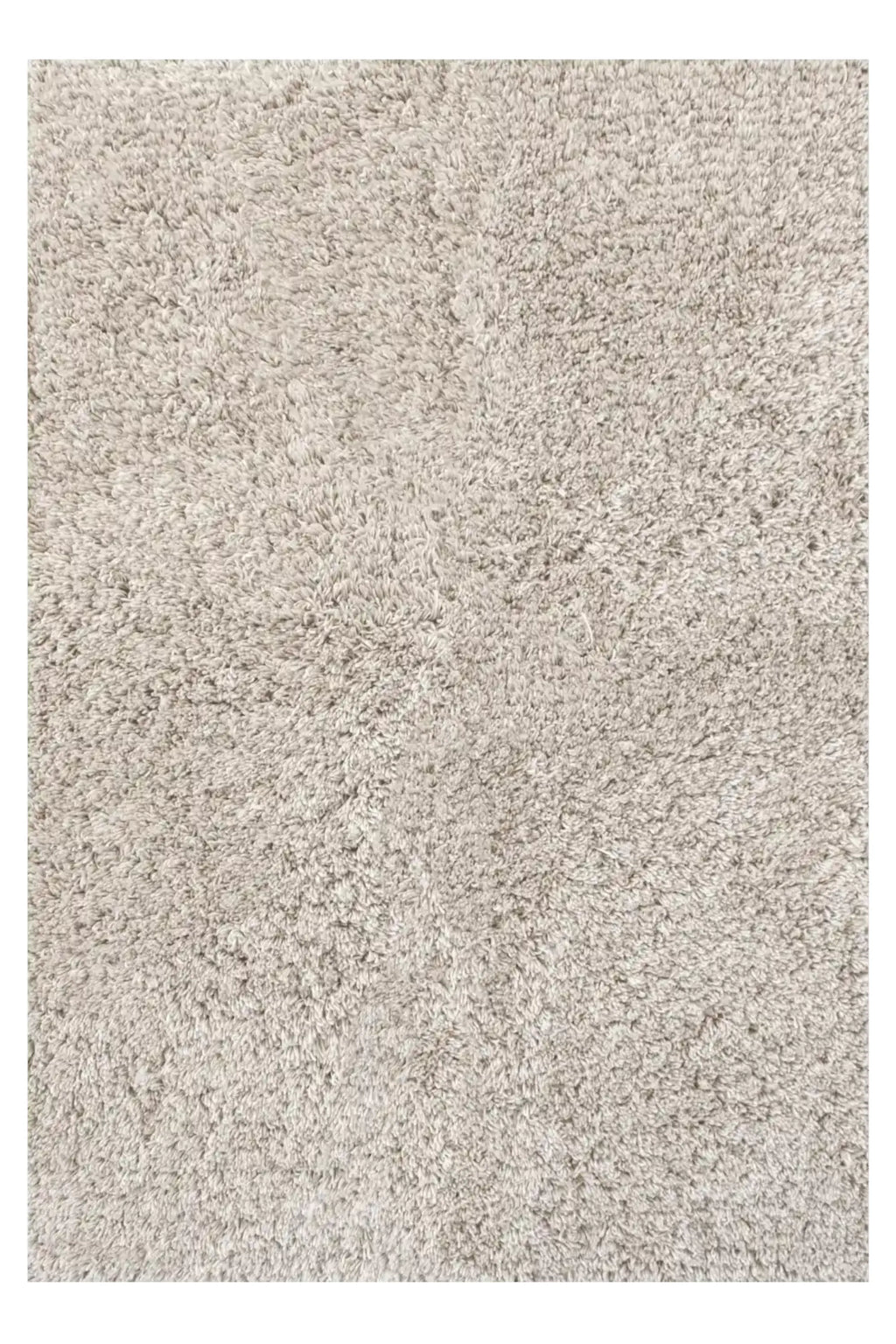 Layered Fallingwater Shaggy Rug, a thick, plush, light beige-grey shaggy area rug with a soft, deep pile texture. Perfect for adding cozy comfort and modern warmth to any living room or bedroom floor.
