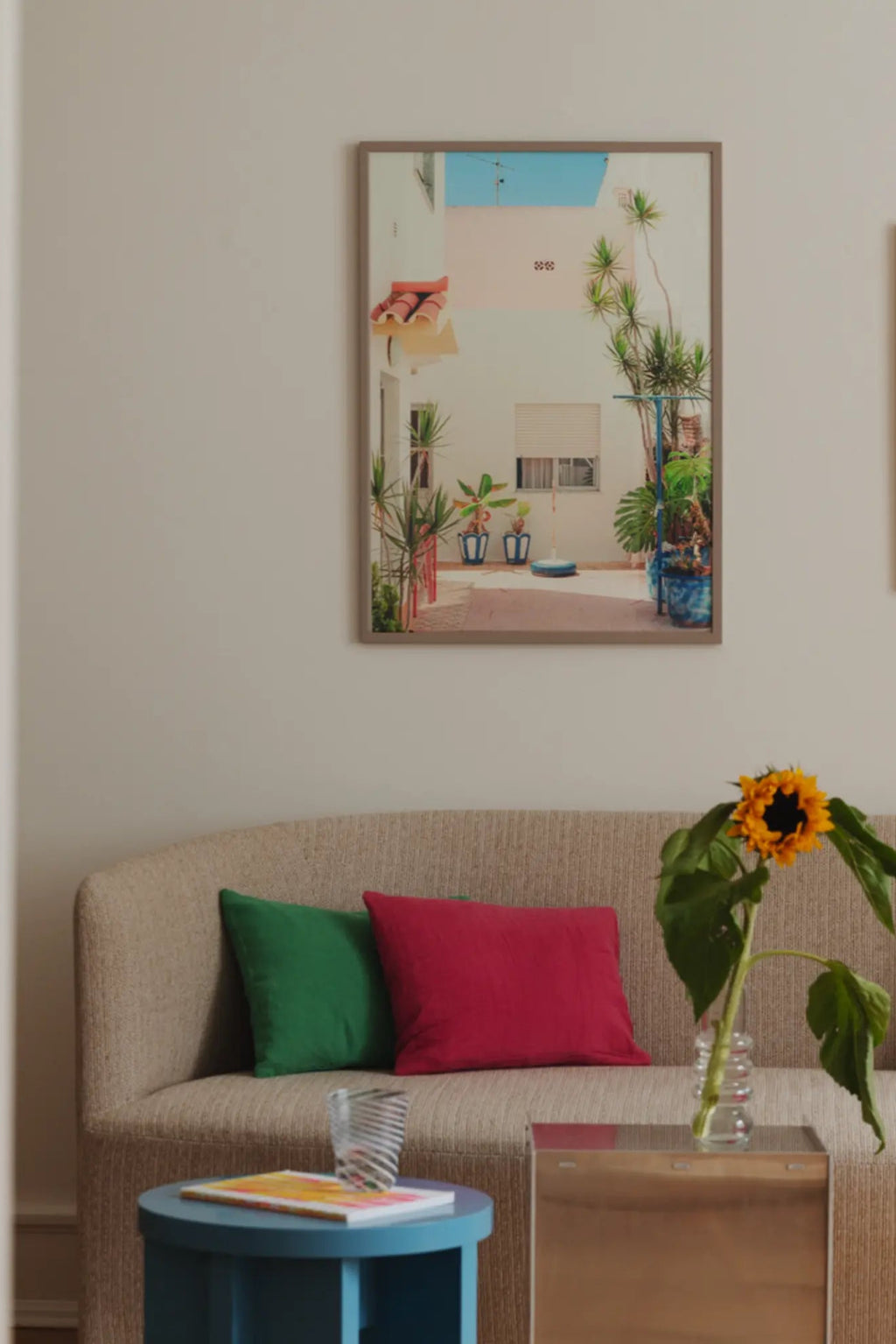 Beautiful sunset over the coastline of Portugal, with colorful buildings and palm trees