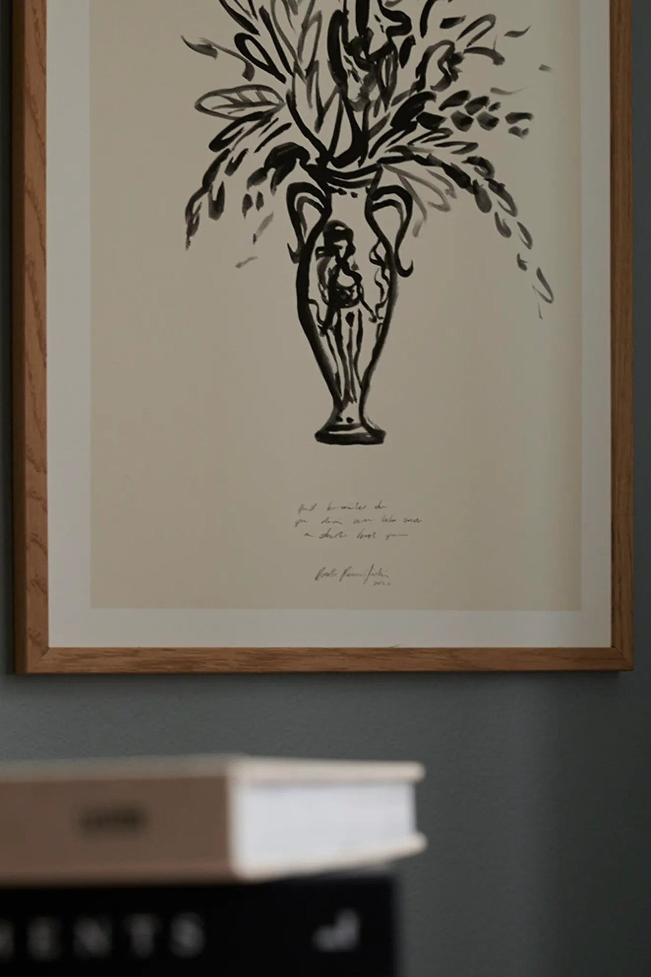 Condolences 02 floral arrangement with white lilies and roses in a white vase on a dark background