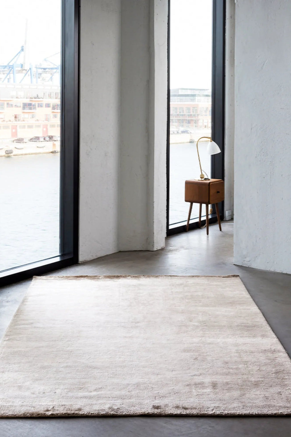 Bamboo area rug with modern geometric pattern in neutral colors