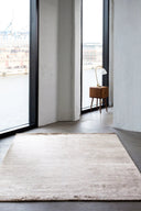 Bamboo area rug with modern geometric pattern in neutral colors