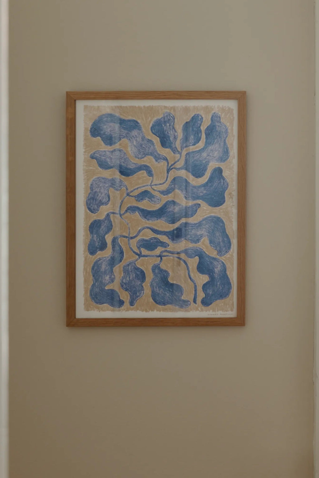 Young woman wearing Rhythm earbuds while working out at the gym