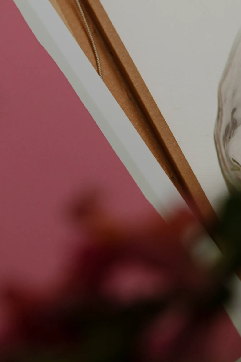 Ruby handcrafted leather purse with floral embroidery and tassel detail