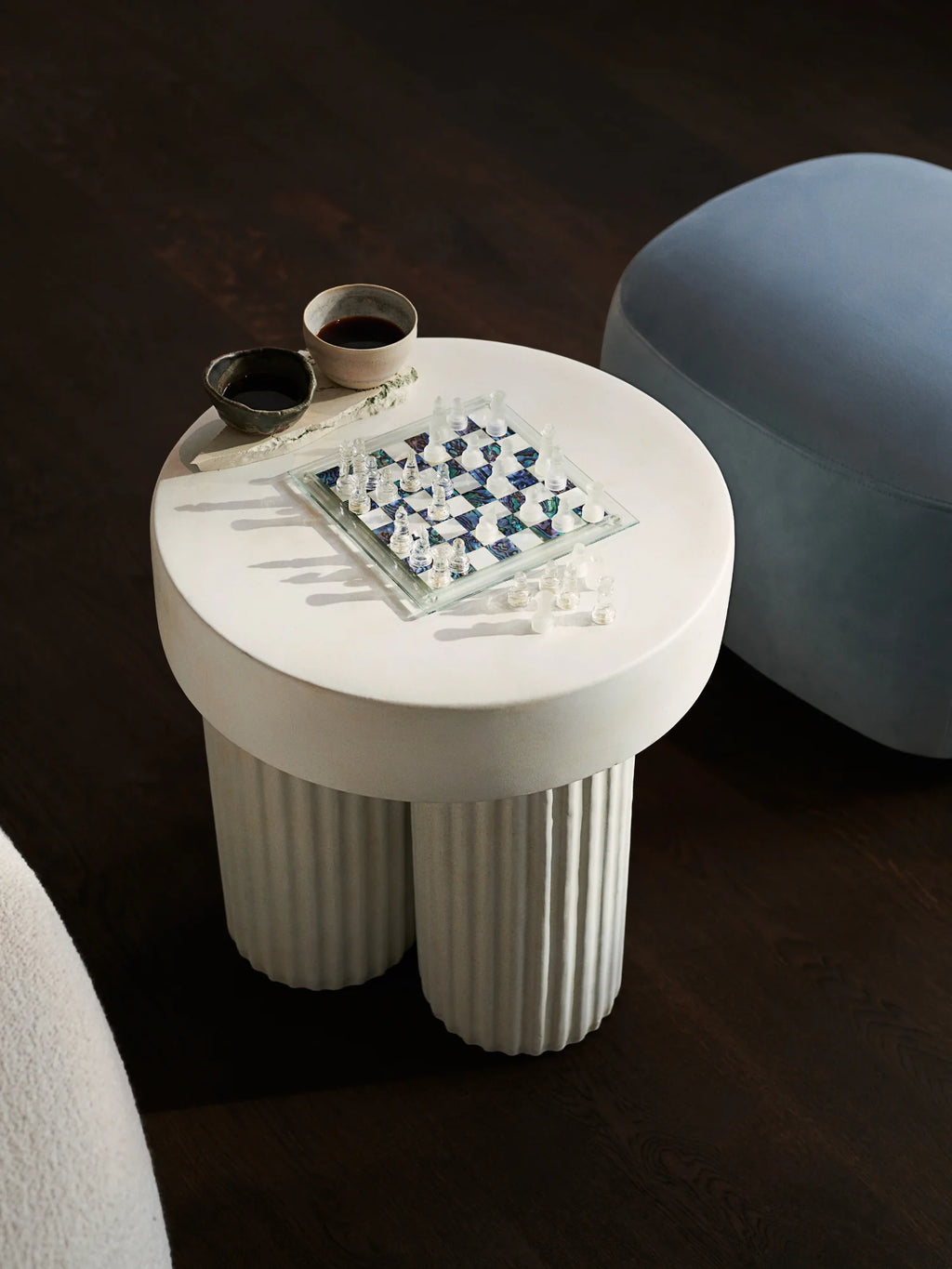 NORR11 Little Big Pouf, a plush, light blue velvet ottoman, offers a modern and elegant touch to any living space. This stylish and comfortable seating solution is perfect for relaxation and adds a sophisticated accent for discerning homeowners.