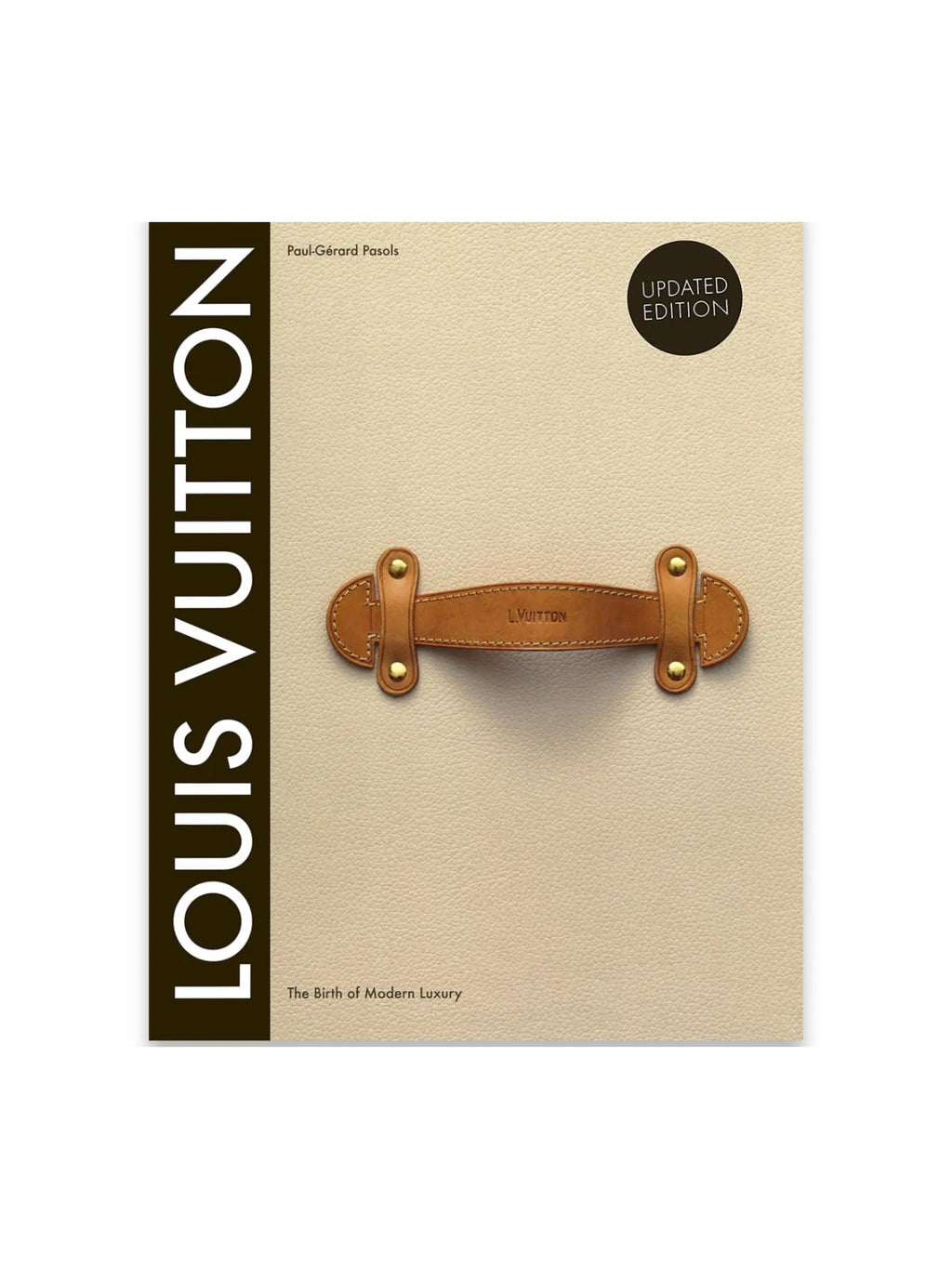 Book Louis Vuitton: The Birth of Modern Luxury, an updated edition hardcover book featuring a textured light beige cover with a prominent dark brown spine and a stylish brown leather handle detail with gold-toned rivets. This luxury fashion book is perfect for fashion enthusiasts, history buffs, and collectors interested in the iconic Louis Vuitton brand.