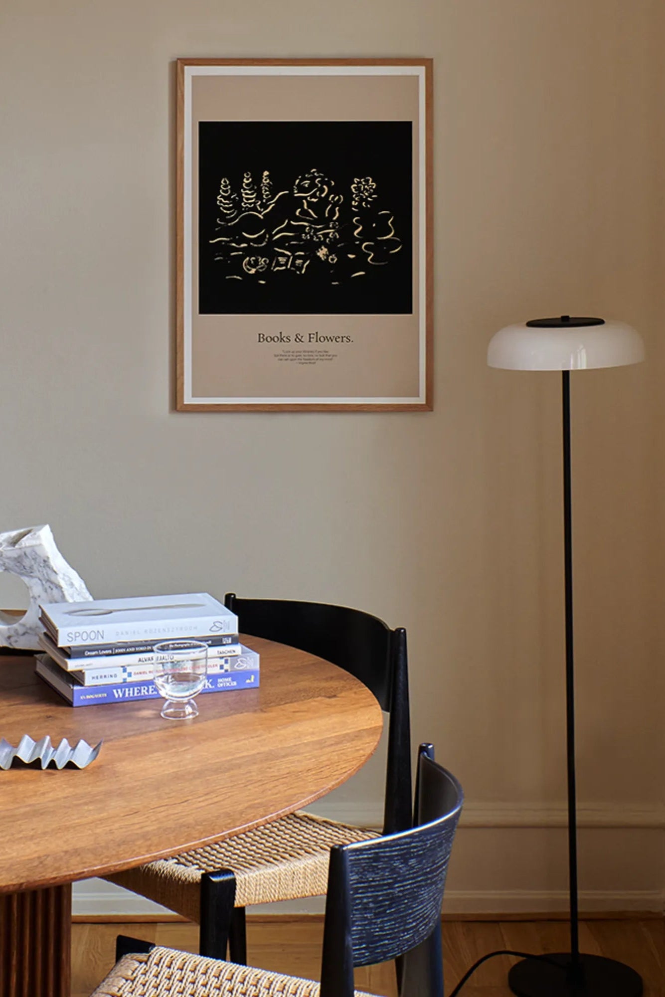 Two people sitting back to back, looking at their phones, disconnected from each other and the world around them