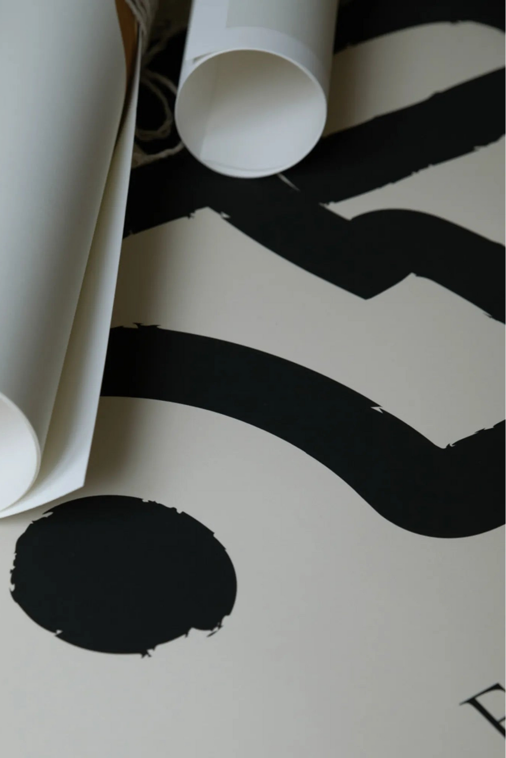 The Poster Club Escalar, a modern minimalist art print showcasing bold, textured black brushstrokes and an organic oval shape against a warm off-white background.