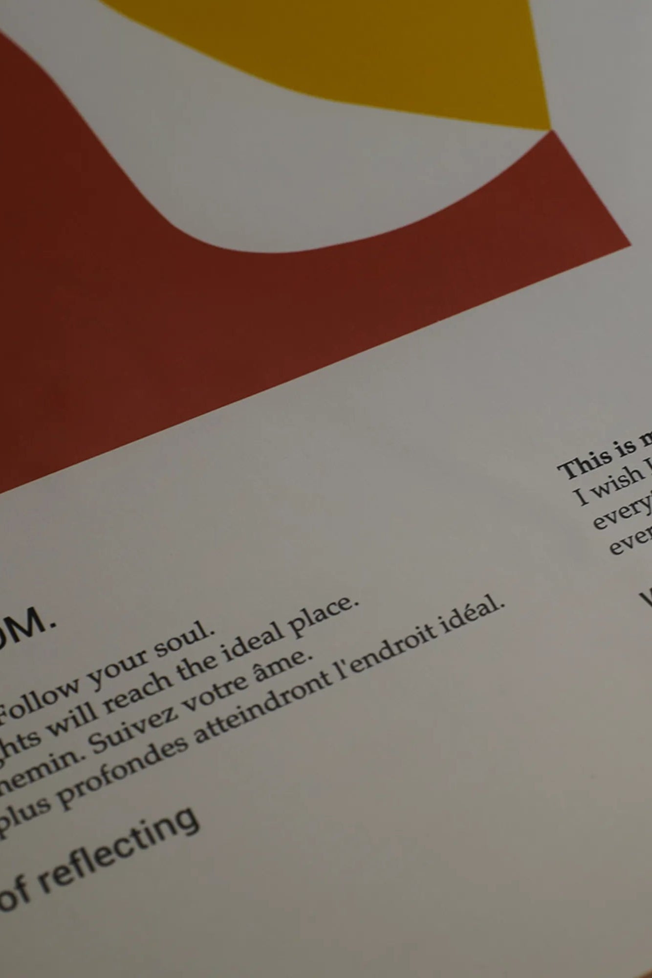 Close up of Le Sens De La Vie perfume bottle with intricate details and gold accents