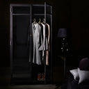 Large metal wardrobe with multiple shelves and hanging rod for clothes