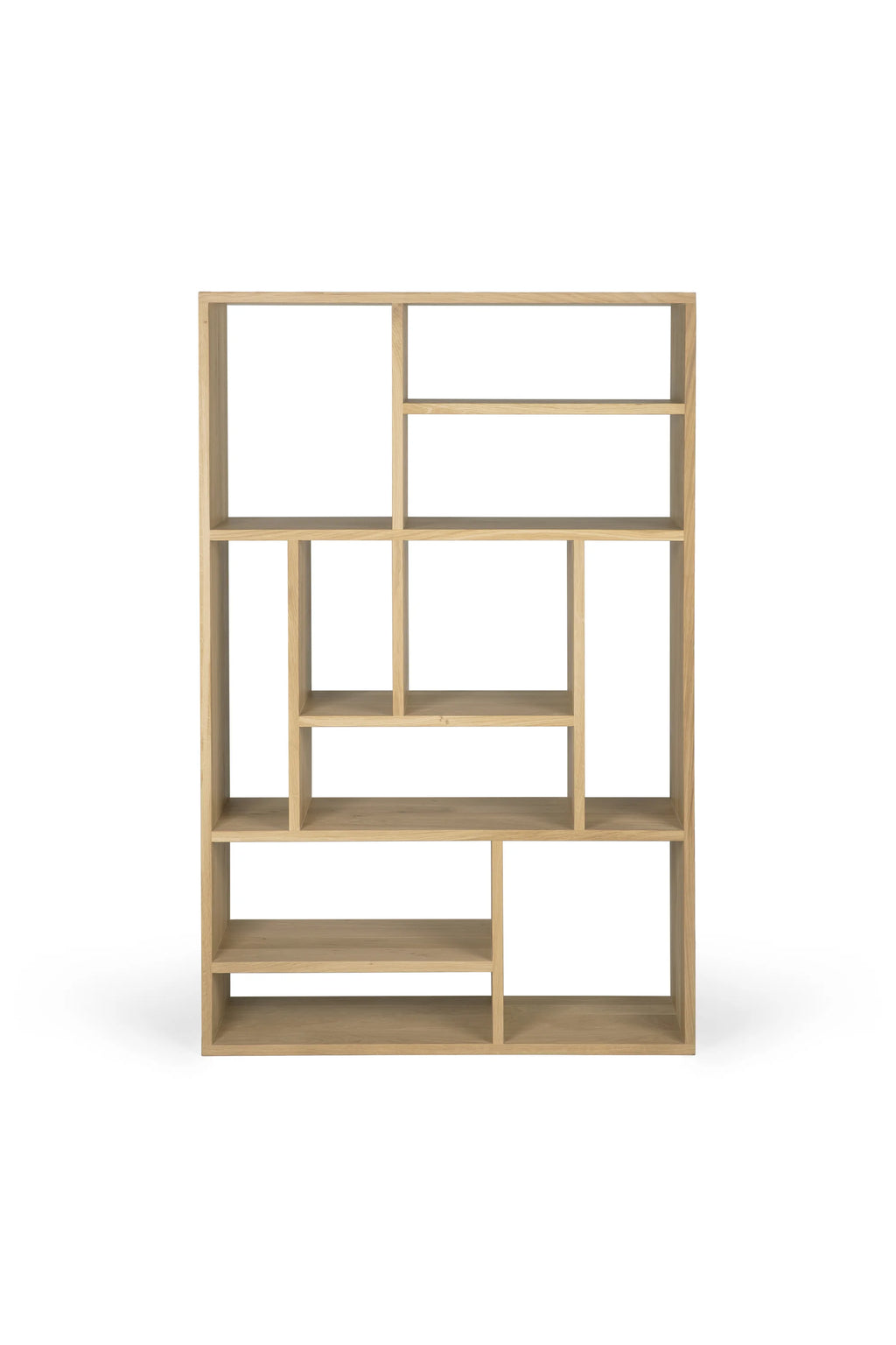 Ethnicraft M Rack, a modern minimalist shelving unit crafted from light natural solid oak wood, featuring an innovative asymmetrical geometric design with varied open compartments. This contemporary oak bookcase is perfect for stylish display storage and shelf styling in Scandinavian living rooms or home offices.