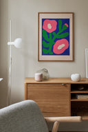Vibrant pink poppies blooming in a lush garden under the bright sunlight