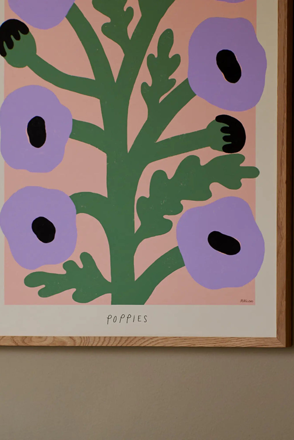 The Poster Club Purple Poppies, a modern minimalist floral art print featuring bold lilac purple poppy blooms with black centers and dark green stems and leaves, set against a soft pale pink background. This contemporary organic abstract poster is framed in natural light oak, perfect for adding a pop of color to Scandinavian living rooms, modern bedrooms, or a playful nursery gallery wall.