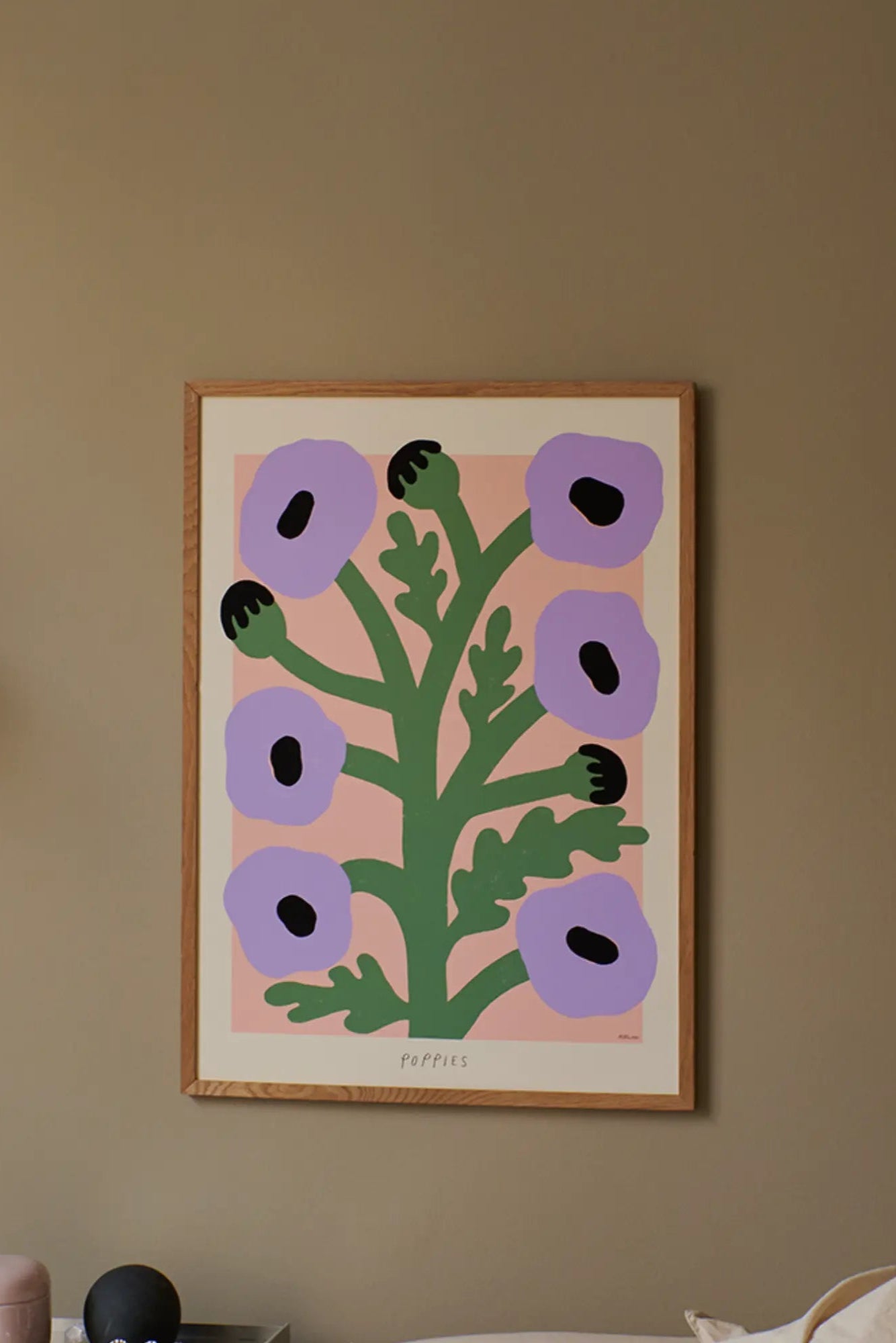 Close-up of delicate purple poppy petals with dew drops