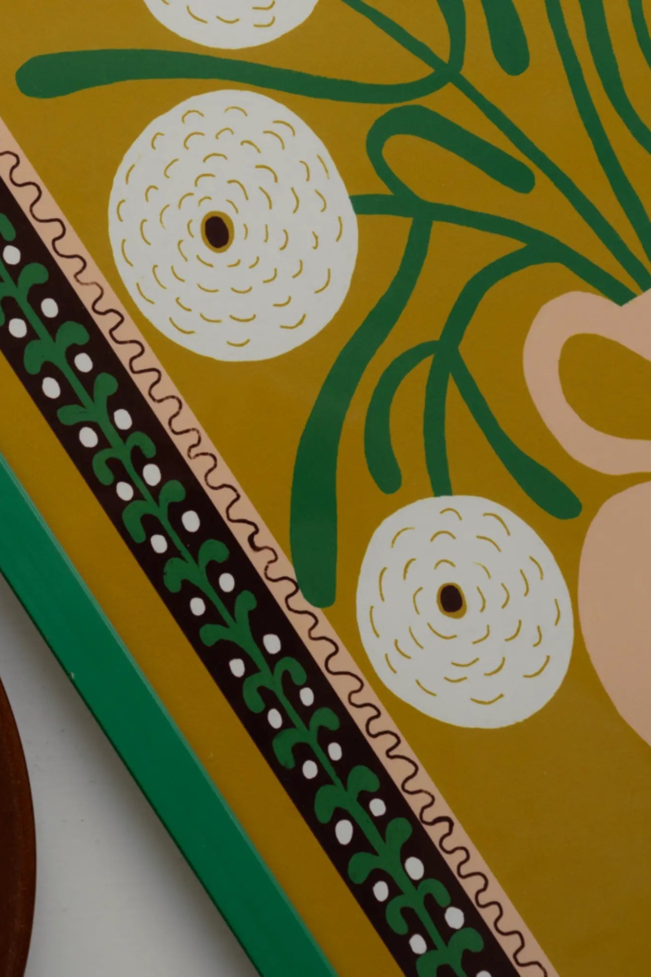 A beautiful arrangement of white marigolds in a transparent vase, adding a touch of elegance to any room