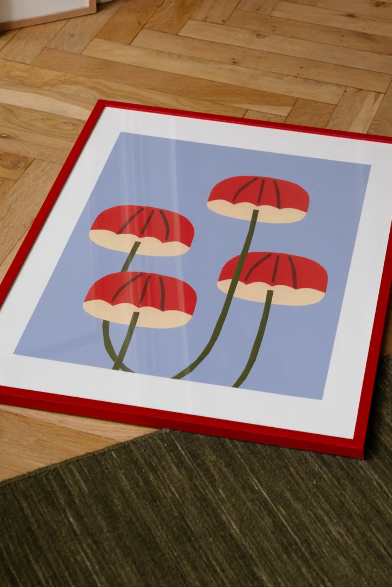 Freshly picked umbrella mushrooms arranged in a wicker basket on a wooden table