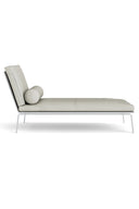 Modern lounge chair with spherical cushion on a white background