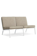 Modern beige sofa with metal legs on a white background