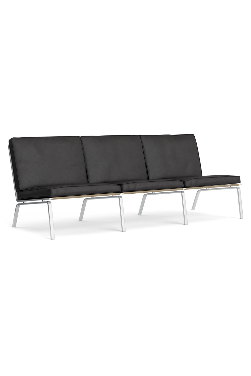 NORR11 Man 3 Seater Sofa, a modern minimalist 3-seater sofa featuring plush black upholstered cushions and a sleek, low-profile design. It boasts a sturdy white powder-coated metal frame with a contrasting light natural wood platform base, offering a contemporary Scandinavian aesthetic. Perfect as a stylish living room sofa, lounge area seating, or a statement piece for modern open-plan interiors.